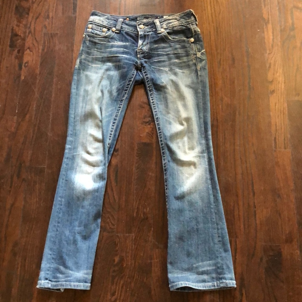 Denim Miss Me with black sequin stitching on back